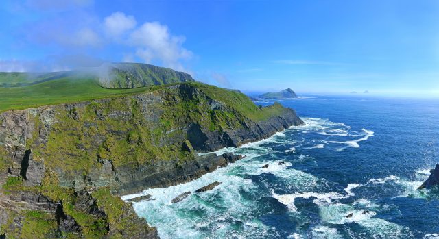 Coastal scenery with the Skellig Islands in the distance